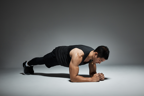 Plank exercise asian male 