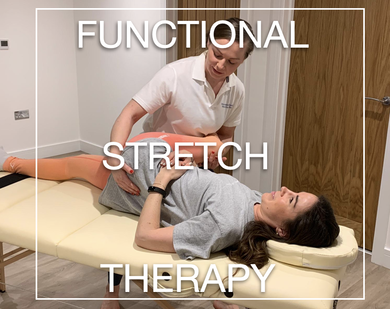 fascial stretch therapist stretching fascia on massage table