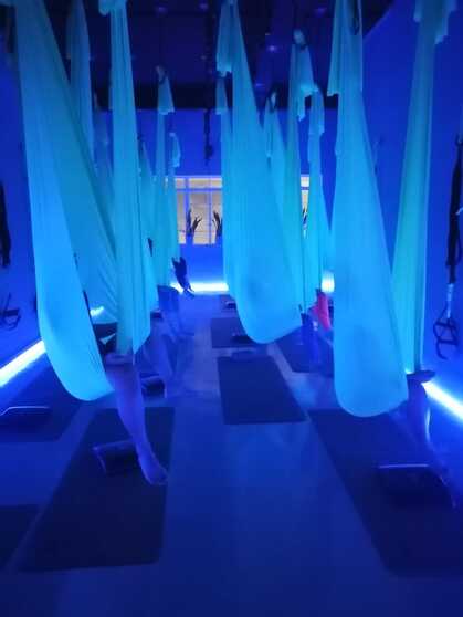 Cocoon Nidra meditation in aerial hammock at MSMC yoga studio with LED lights Singapore